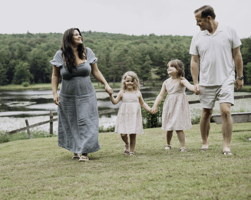 Family portrait by lake taken by Whimsy Photo Studio, a professional photographer in Broome County, NY